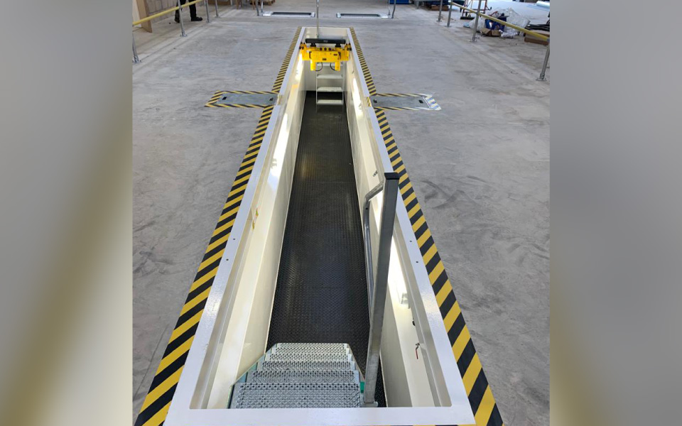 Prefabricated steel inspection pit for the safe servicing of Derbyshire County Council's local authority vehicle fleet, ranging from RCVs to vans and trucks