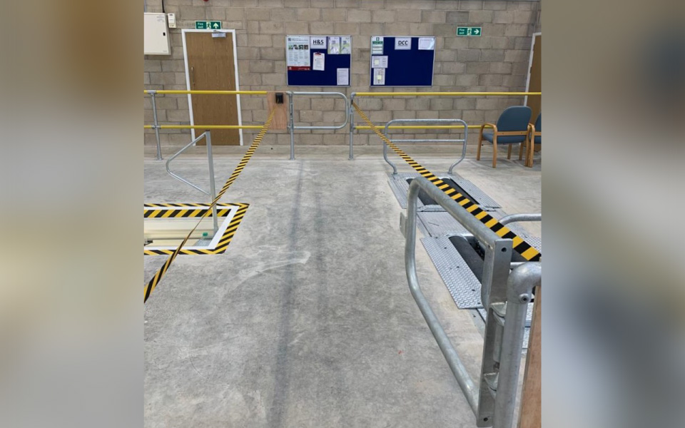 Inspection pit safety barriers around the vehicle working area, helping the client to remain compliant with health and safety regulations
