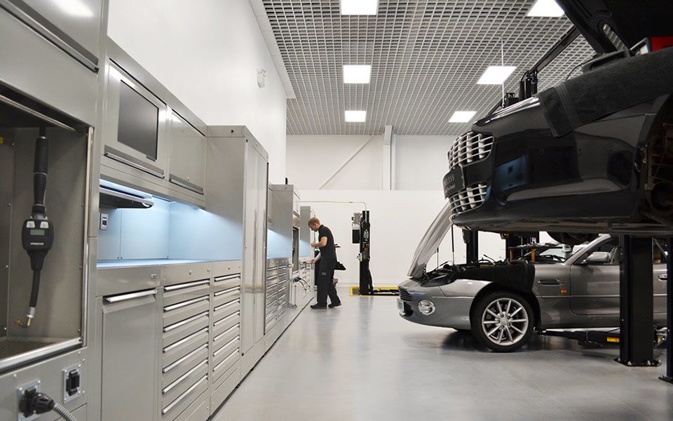 Engineers using workshop furniture installed by CCS Garage Equipment