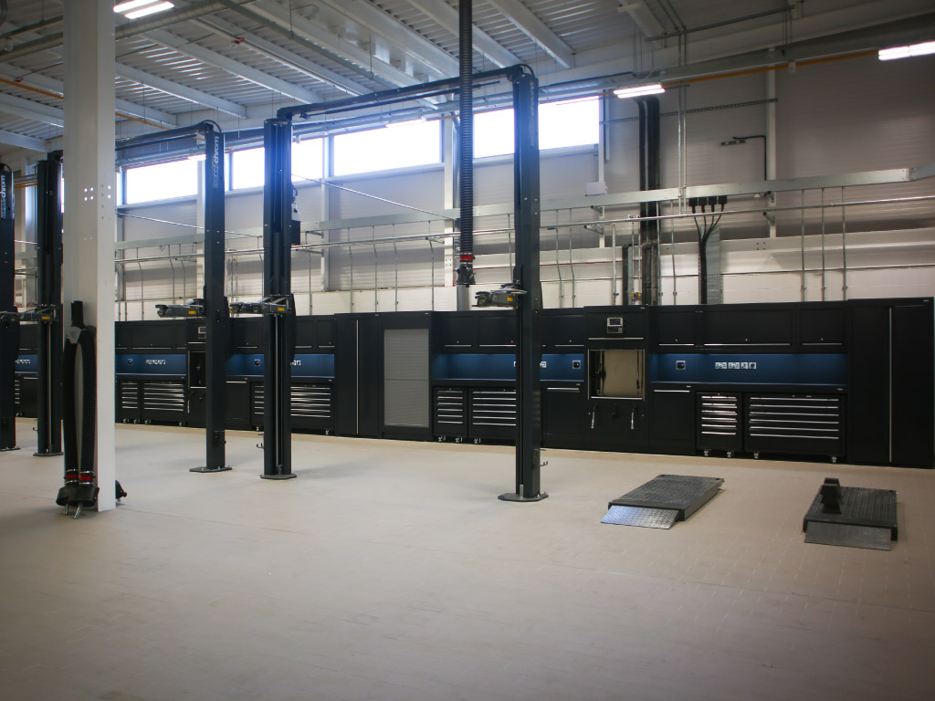 CCS Garage Equipment completed installation of fixed 2-post vehicle lifts, LEV fume extraction & bespoke Dura workshop furniture for BMW Mini vehicle servicing & maintenance workshop in Crewe, Cheshire