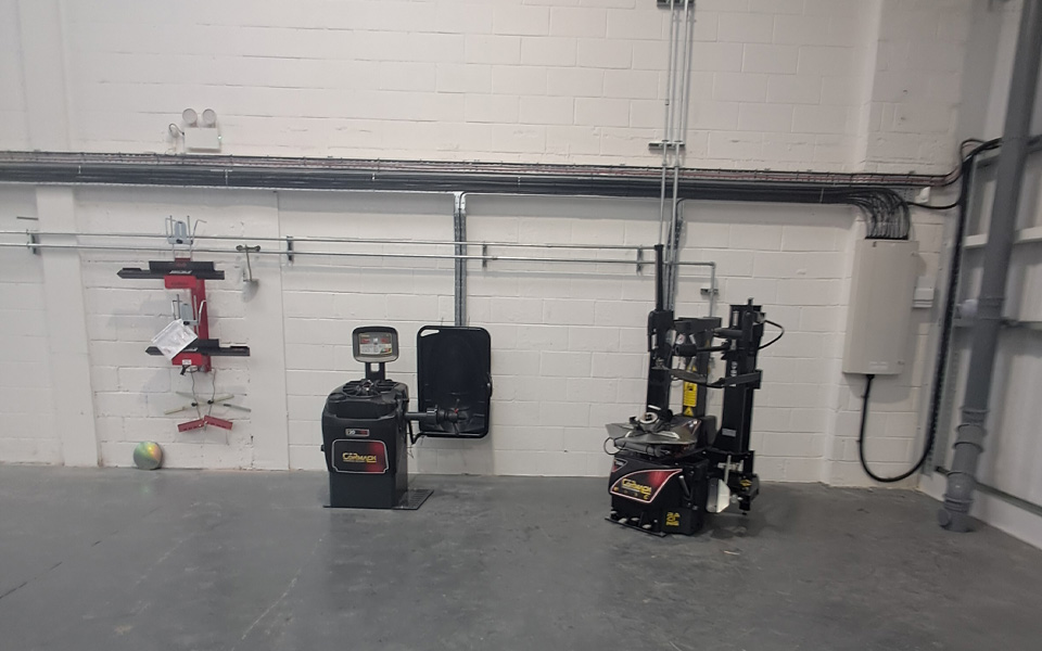New Tyre changers and wheel balancer equipment installed for Clive Suttons north London workshop.