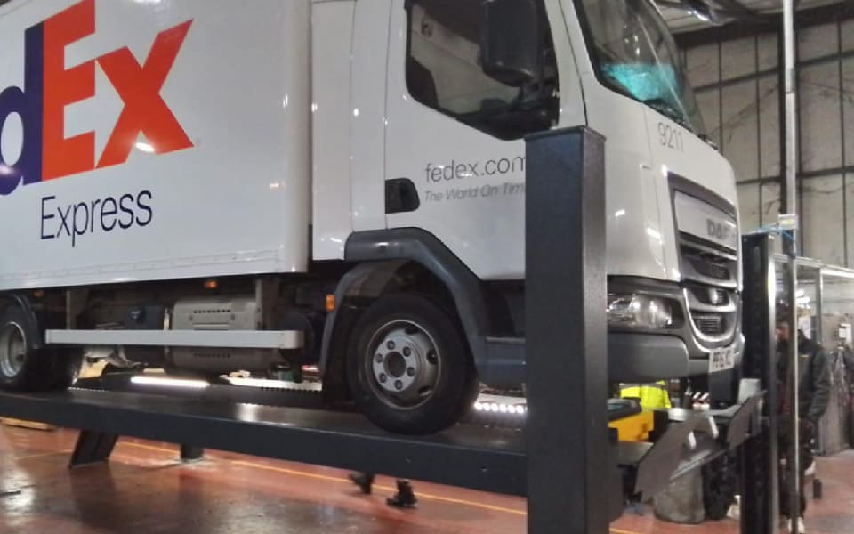 4. A FedEx fleet vehicle during servicing, lifted by Nussbaum Combi Lift technology which on this model incorporates integrated LED lighting to aid technicians during each job.