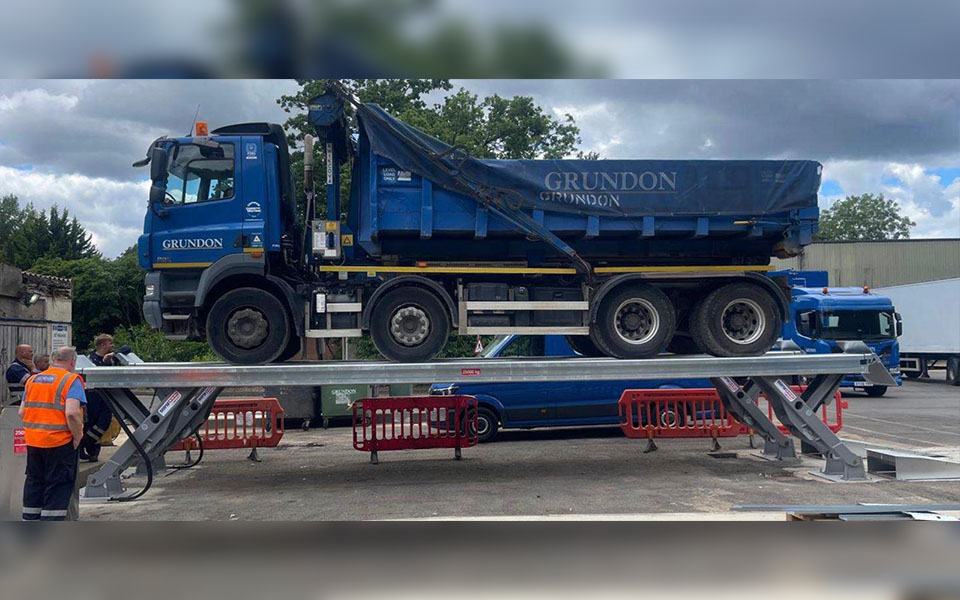 Stertil Koni wash bay vehicle lift installed by CCS Garage Equipment holding a Grundon Waste vehicle.