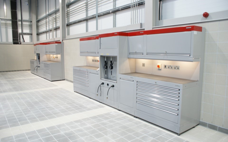 Bespoke cabinets and small tool storage with integrated lighting by Dura, supplied by CCS Garage Equipment for Cheshire Oaks workshop