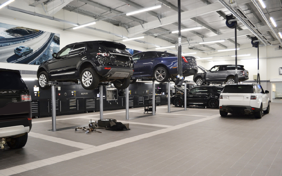 In-ground vehicle lifts with increased lifting capacity for large vehicles at Jaguar Land Rover’s dealership by CCS Garage Equipment