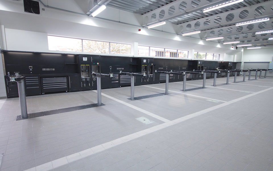 2-post in-ground vehicle lift installation with excellent lifting capacity completed by CCS Garage Equipment for Jaguar Land Rover, Battersea