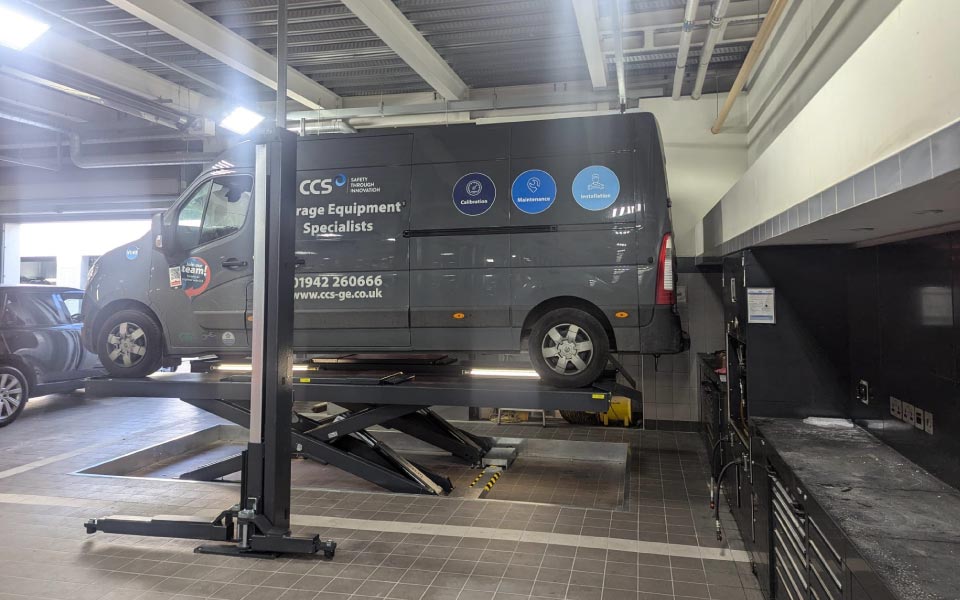 Versatile Uni Lift comfortably accommodating our vehicle lift installation engineer's van