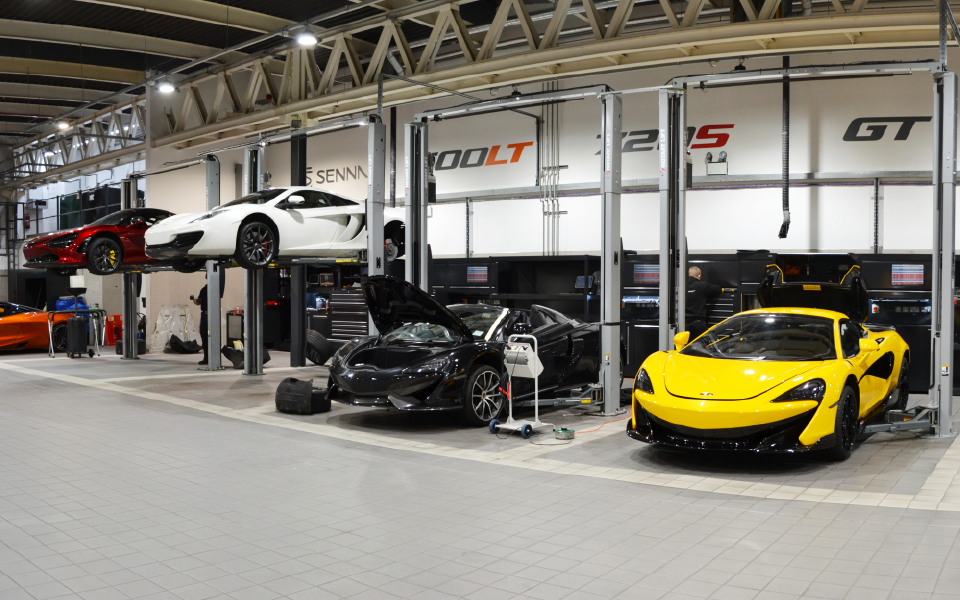 Sleek and spacious servicing workshop in Ascot at McLaren’s dealership, featuring garage equipment installation by CCS Garage Equipment