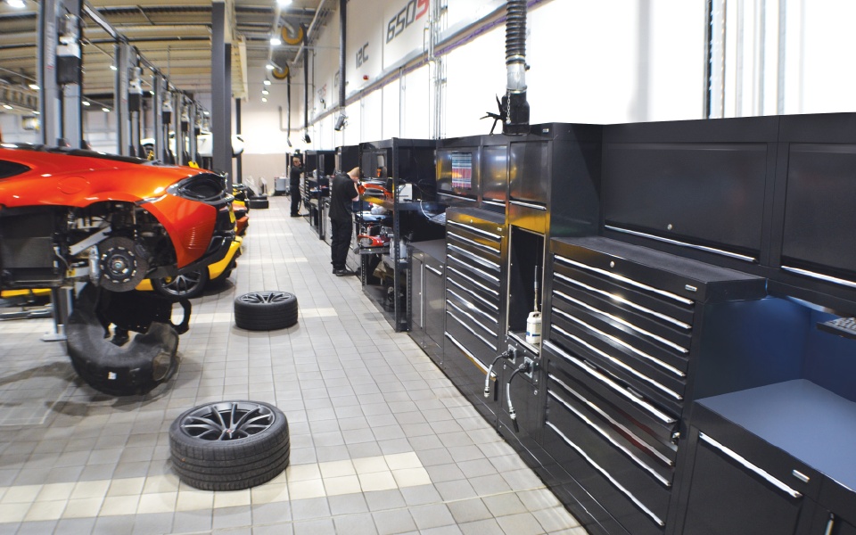 Completed garage equipment installation by CCS Garage Equipment at McLaren Ascot, incorporating bespoke Dura workshop furniture for a tidy and safe workshop