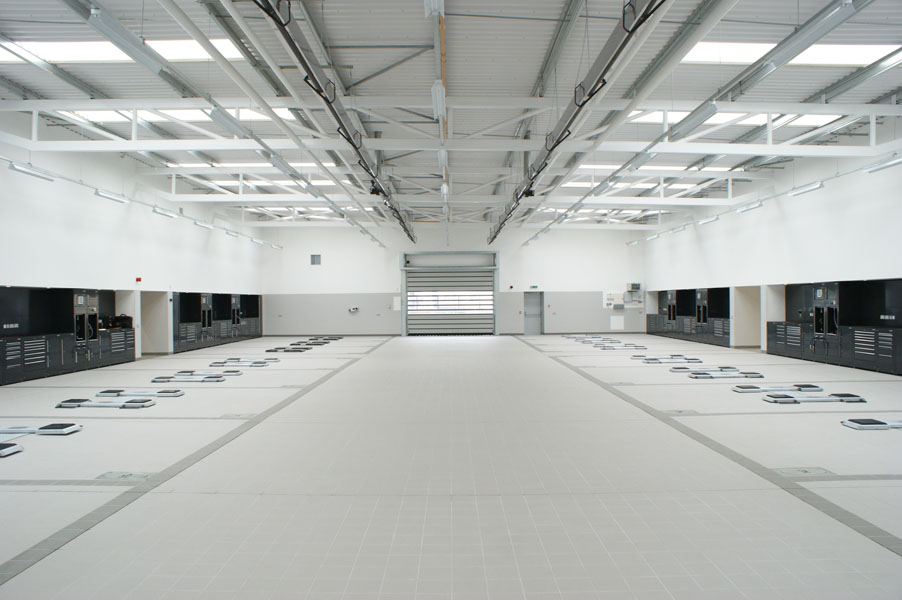 Service bays equipped with 2-post in-ground vehicle lifts for a complete garage equipment installation delivered by CCS for South East vehicle dealership