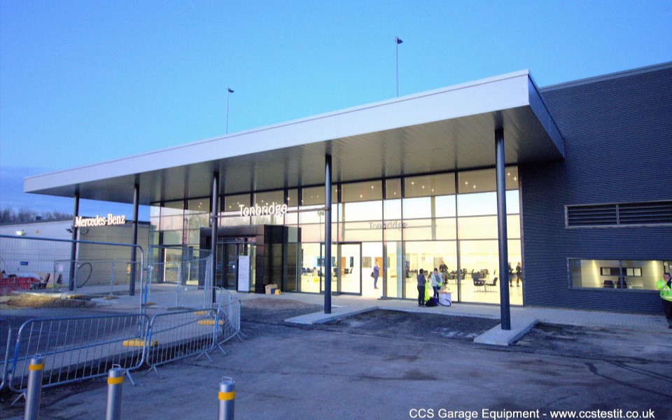 Exterior of Mercedes-Benz dealership’s showroom and workshop building during construction in Tonbridge, Kent
