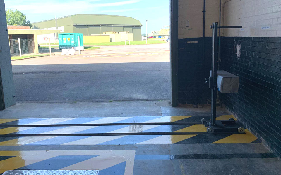 Completed military air base’s vehicle inspection test lane with a reliable headlamp tester, fit into recessed rails.