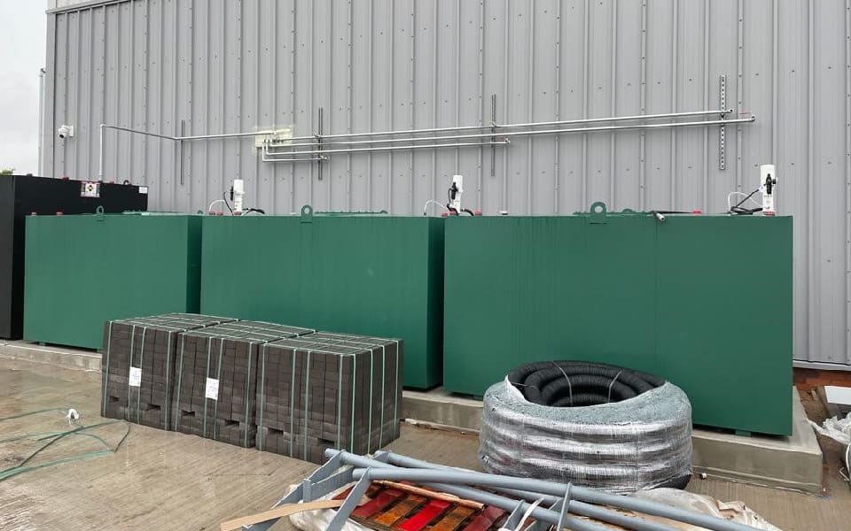Bunded waste oil storage tanks for commercial vehicle workshop