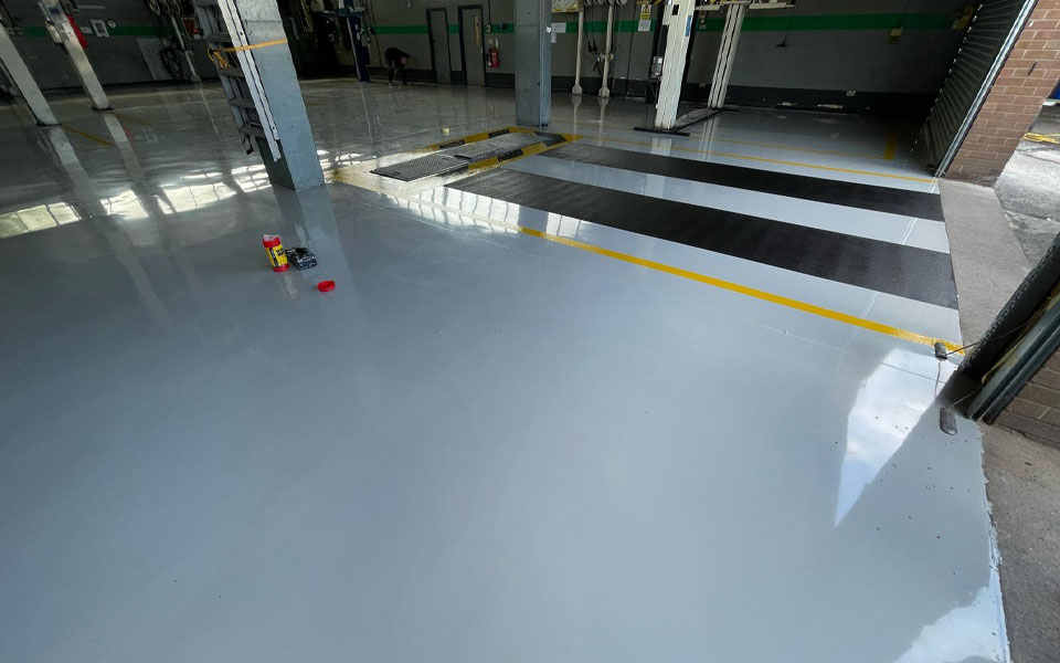 Smooth professionally finished commercial workshop floor by CCS for Northgate Vehicle Hires Derby Depot