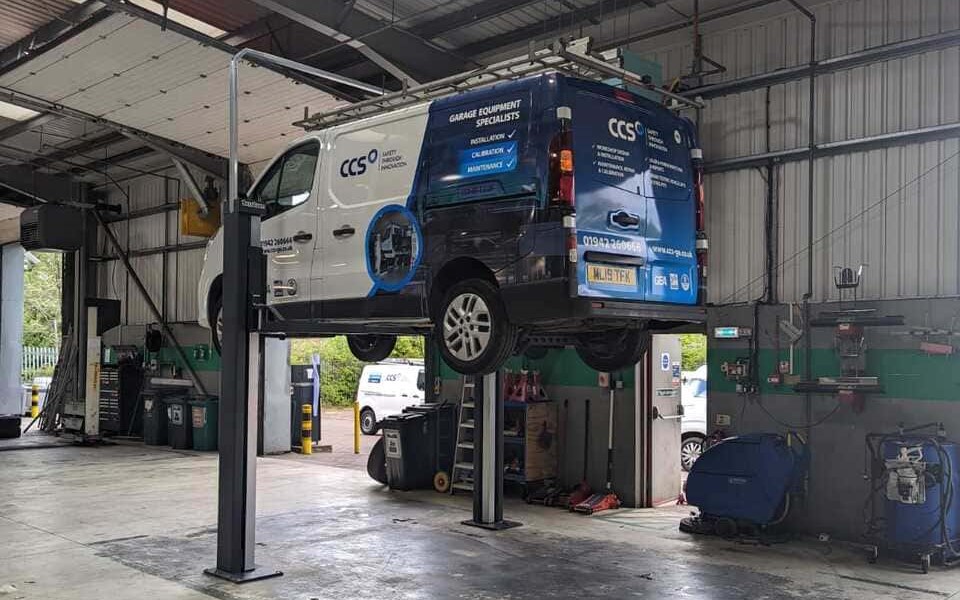 Photo of newly installed 2 post vehicle lift for vehicle hire operator