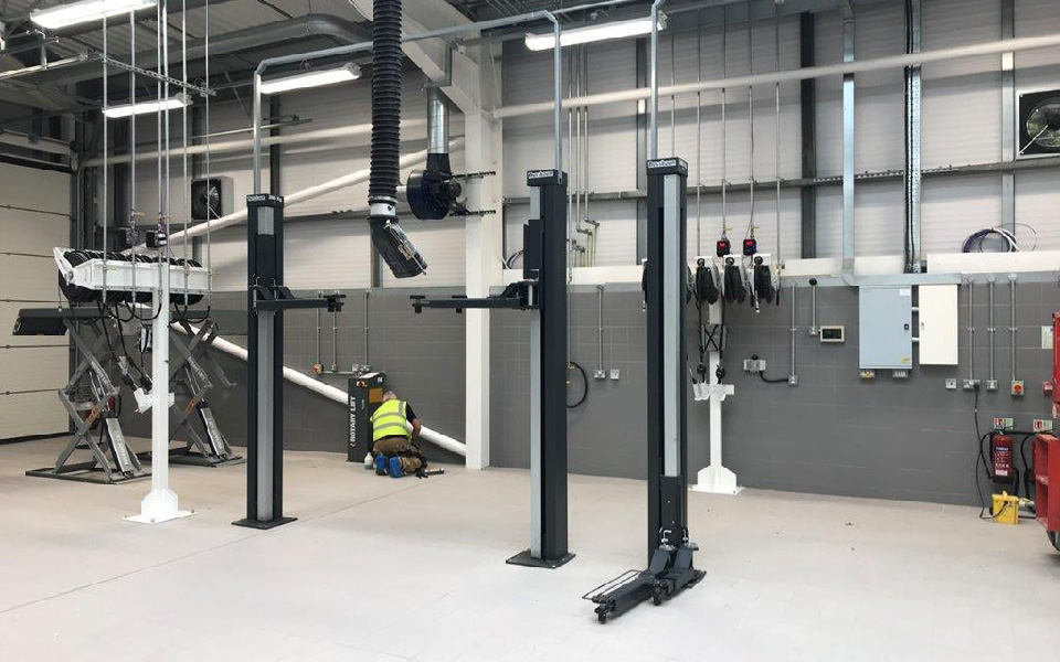 Bespoke garage equipment installation featuring fixed 2-post vehicle lifts by Nussbaum, supplied by CCS for Renault, Stockport