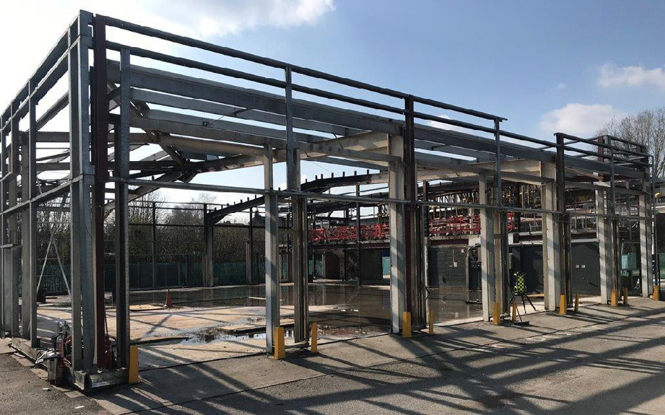 New build Renault dealership and servicing workshop under construction in Stockport, Cheshire