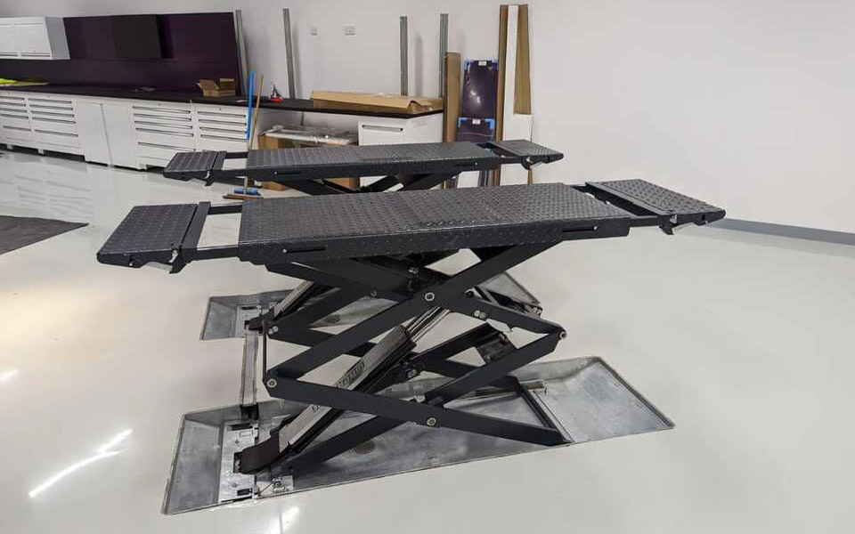 Garage equipment including Dura workshop furniture installed at Rolls Royce, Chichester’s small vehicle workshop