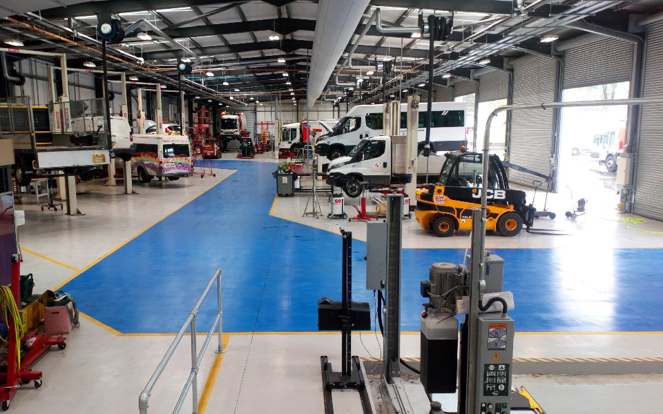 Local authority garage equipment installation for Swansea Council’s new vehicle workshop, including mobile column lifts, commercial fixed 4-post lifts, MOT bays and ancillary kit