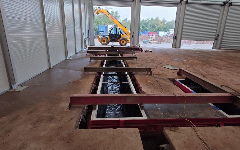 Installation of inspection pits in commercial vehicle workshop