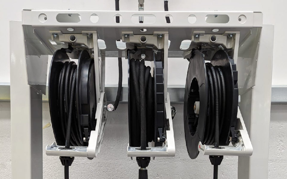 Photo shows installation of Samoa lubrication garage equipment