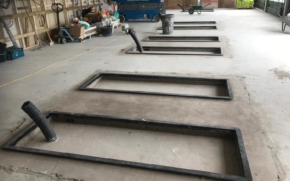 New-build service centre garage equipment installation by CCS Garage Equipment for Volvo in Shrewsbury featuring a suite of recessed scissor lifts in line with Volvo standard specification