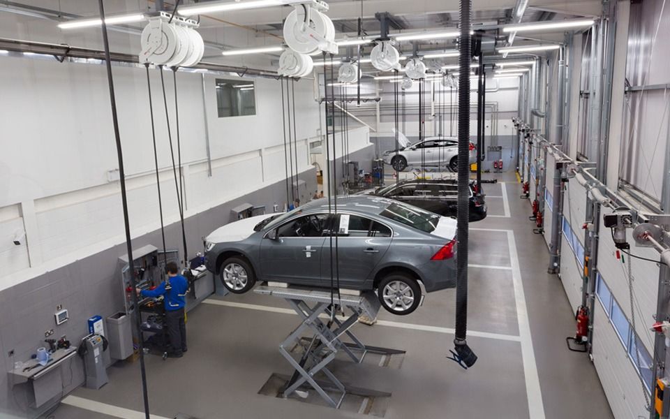 Recessed scissor lifts and LEV systems at 5 service bay and MOT bay Volvo, Stockport garage equipment installation by CCS Garage Equipment