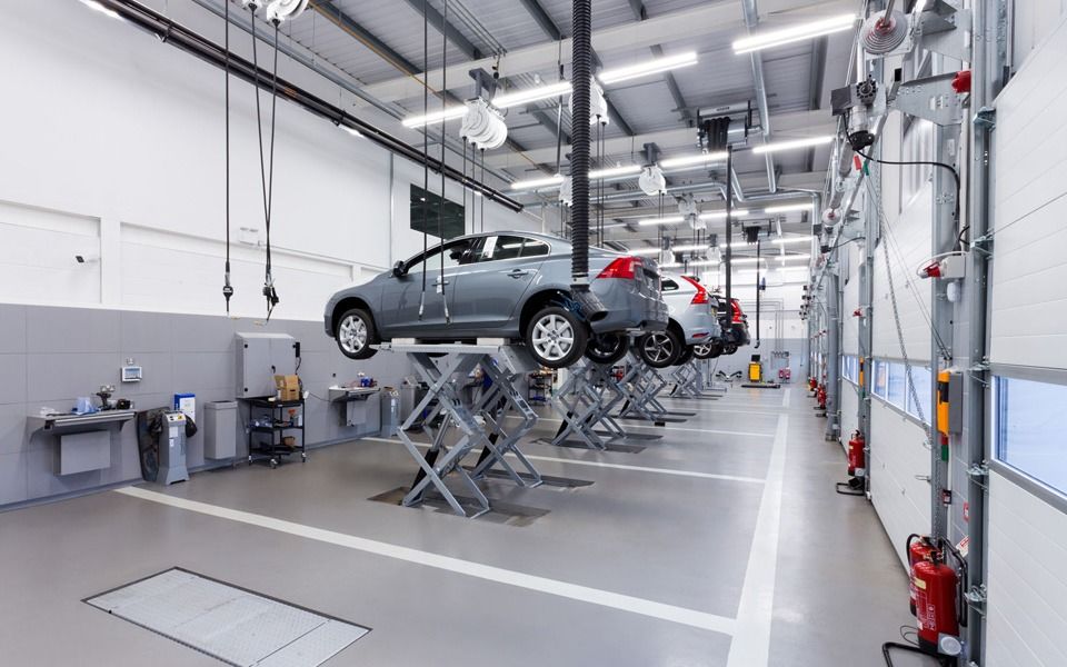 Garage equipment installation of scissor vehicle lifts and workshop ancillary LEV, lubrication and compressed air services at Volvo’s Stockport dealership by CCS Garage Equipment