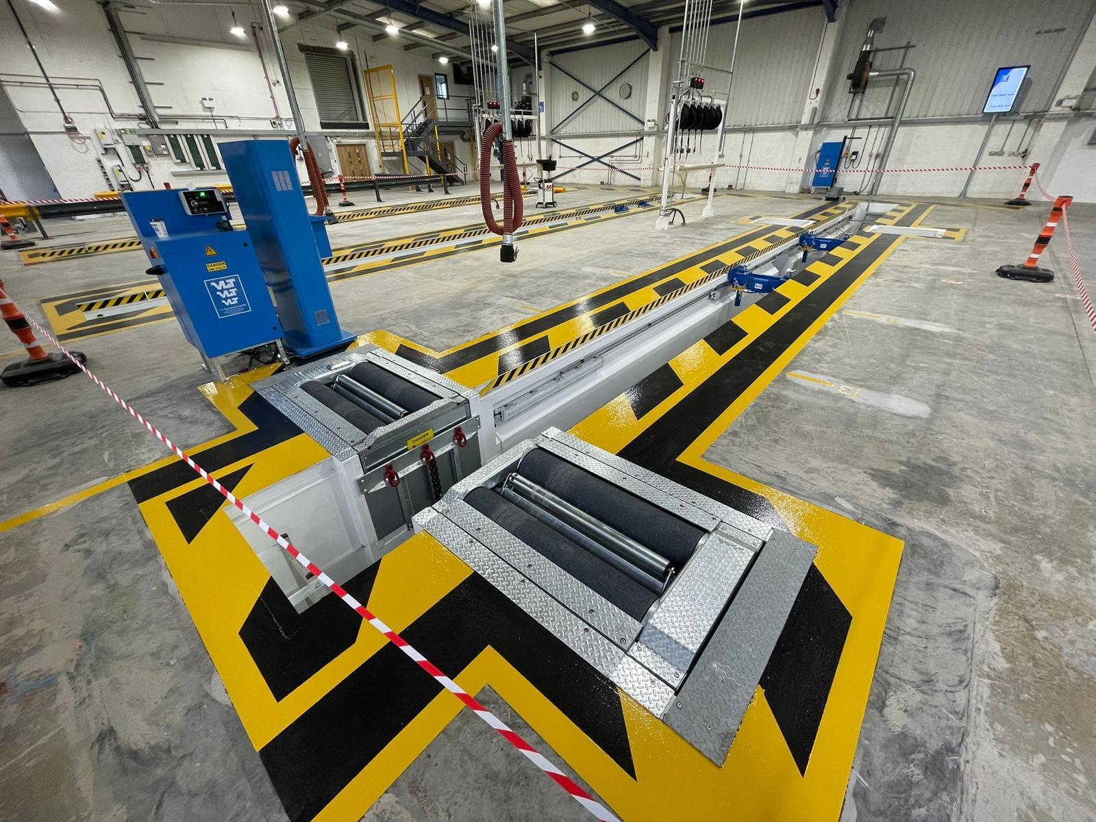 2 new simulated load brake testers inside of Adams Moreys Plymouth Depot.