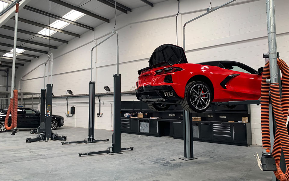 New vehicle dealership featuring Nussbaum Power Lifts installed by CCS Garage Equipment.
