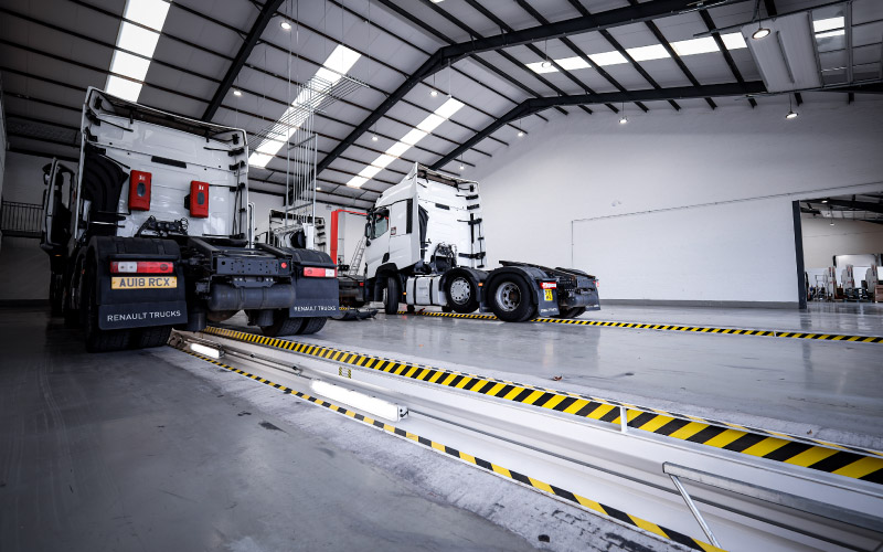Prefabricated steel inspection pits in operation at Diamond Trucks' Warrington site, offering safe access to commercial vehicles during servicing, inspection and maintenance.