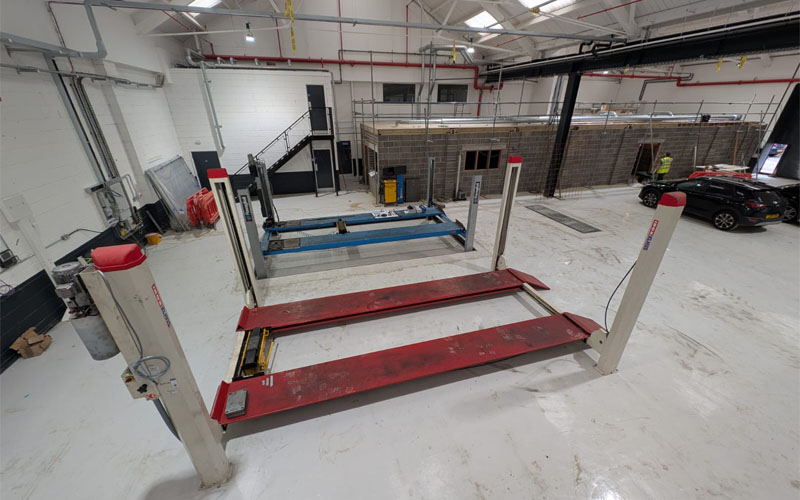 Stertil Koni 4 Post Vehicle lift relocated from Adams Moreys former Southampton workshop.