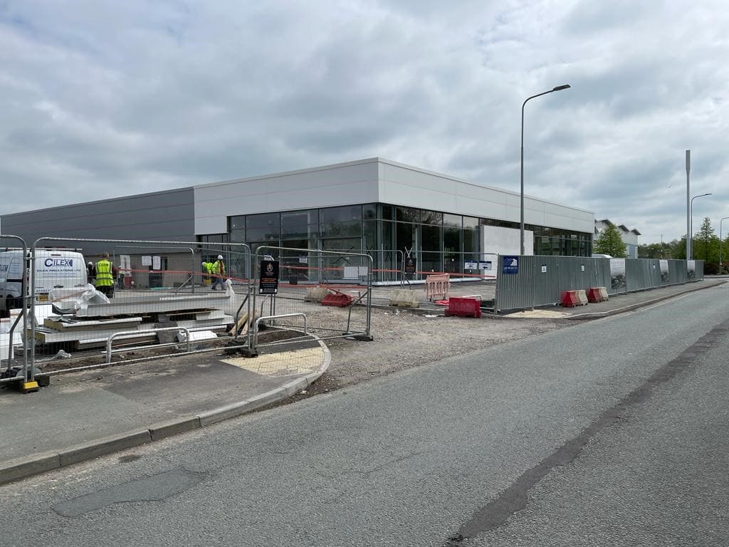 The exterior of the new Lookers BMW Crewe dealership premises in Cheshire, incorporating a sleek new showroom with our state-of-the-art vehicle servicing and maintenance workshop to the rear.