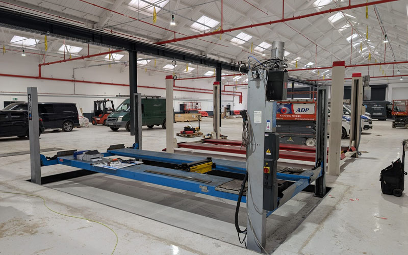 MOT bar reolcated and reinstalled by CCS inside of Adams Moreys new vehicle workshop.