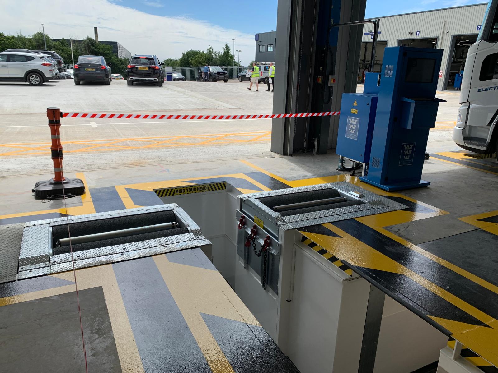 VLT simulated load commercial brake tester featuring blue floor mounted data entry cabinet.